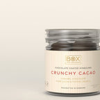 Box The Original Crunchy Cacao i tube med 110 g chokoladeovertrukket vingummi